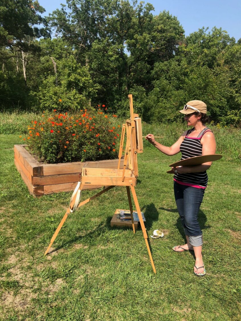 Photo of Laura Andrews painting